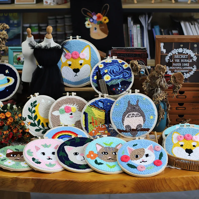 Circular tufted embroidery artworks with animals and famous paintings