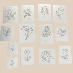 water-soluble stick and stitch designs featuring 13 hand-drawn botanical motifs