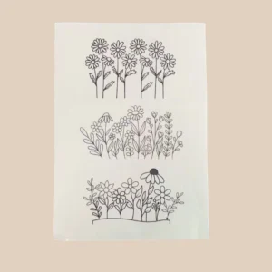 embroidery sticker paper with three unique flower and garden scenes
